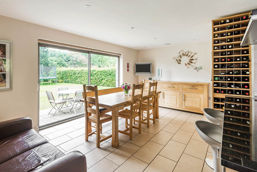 The dining area with free-flowing access out onto the external terrace.